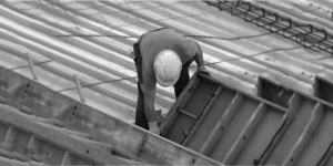 man working on building